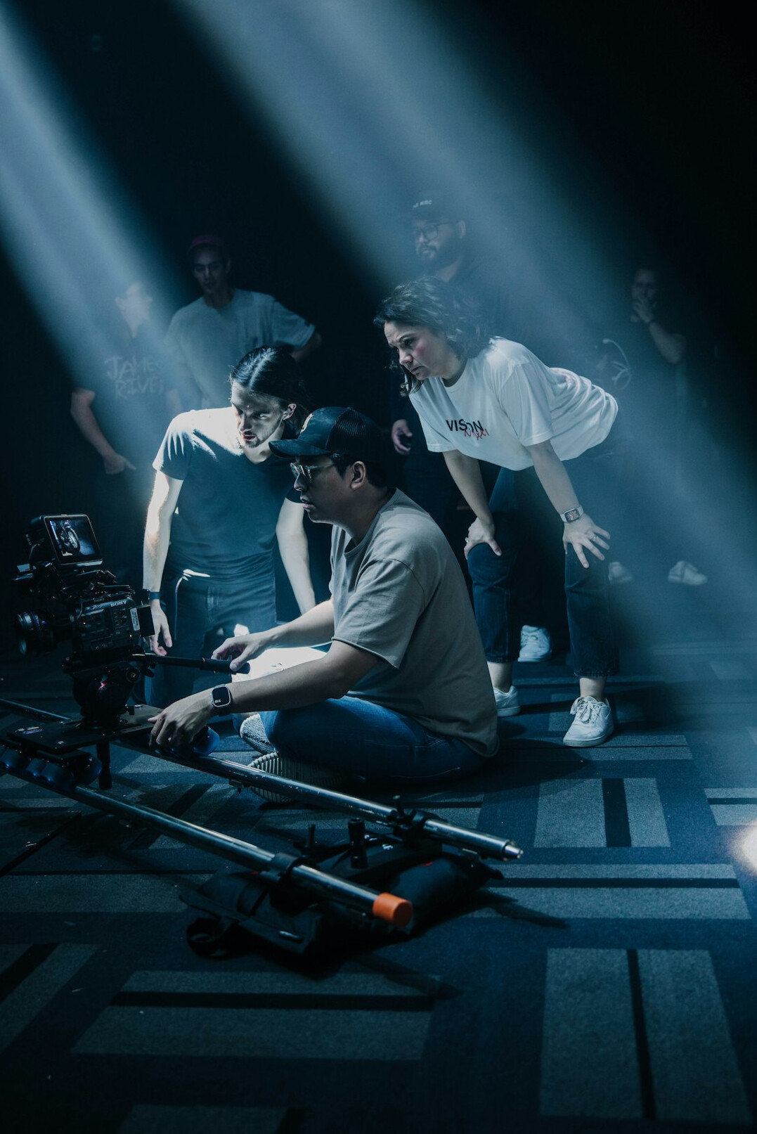 cinematographer adjusting lights