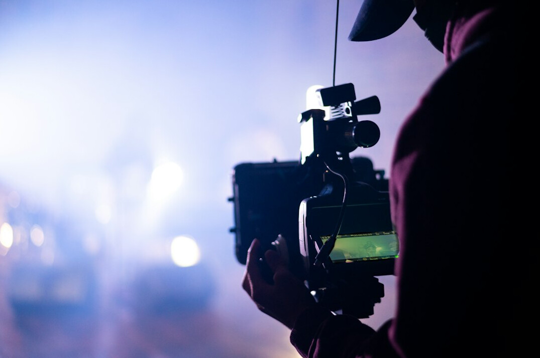 cinematographer adjusting lights